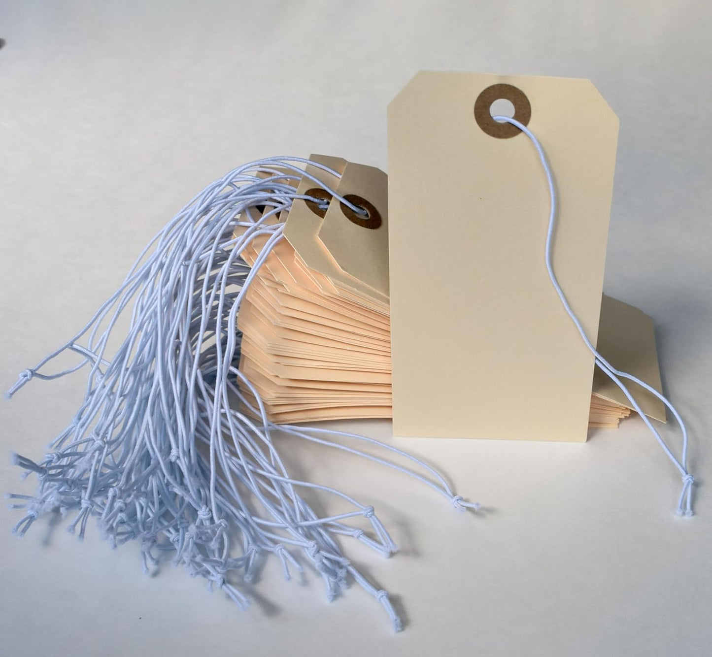 Tags with Elastic String Attached - #5, 4 3/4" x 2 3/8" Box of 200 Manila Paper Label Tags with Elastic Loop and Reinforced Hole